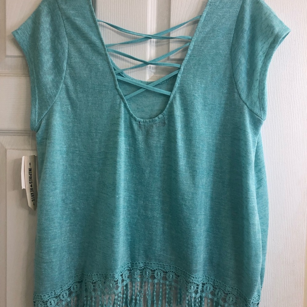 Top with criss cross back and fringe along bottom - Picture 2 of 3